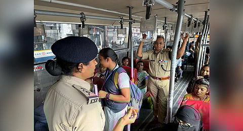 Bengaluru City Police Commissioner B Dayananda along with other police officers travels on a BMTC bus on Monday | Express