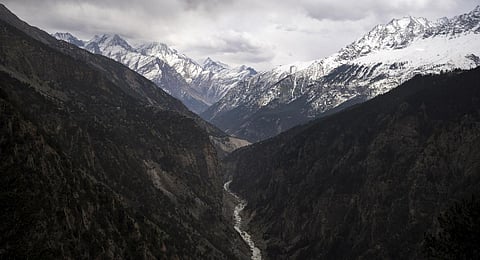 FILE - The Sutlej River flows in the valley below the tall snowy peaks in the Kinnaur district of the Himalayan state of Himachal Pradesh, India, March 13, 2023. (Photo | AP)