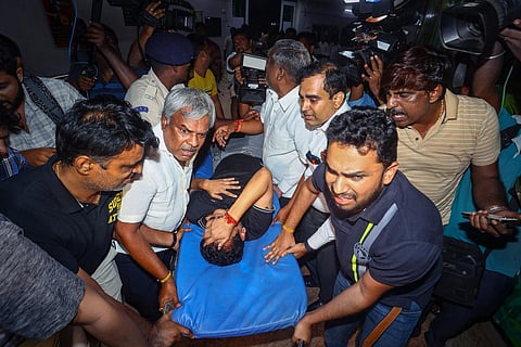 TN Electricity Minister V Senthil Balaji reacts in pain while being taken to a government hospital after his arrest in connection with a money laundering case, in Chennai. (Photo | PTI)