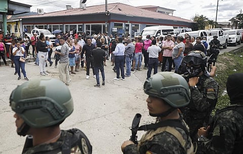 Police guard the entrance to the women's prison in Tamara, on the outskirts of Tegucigalpa, Honduras. (Photo | AP)