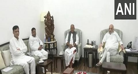 Hindustani Awam Morcha leader Jitan Ram Manjhi meets Amit Shah.(Photo | ANI Twitter)