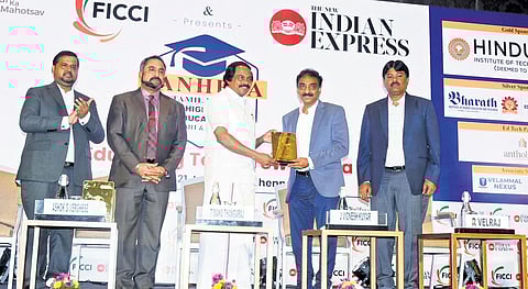 Minister Mano Thangaraj gives away awards at the at the Tamil Nadu Higher Education Summit and Awards in Chennai on Wednesday | P Ravikumar