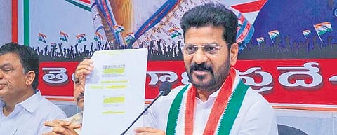 TPCC chief A Revanth Reddy addresses the media in Hyderabad on Thursday