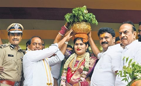 Ministers A Indrakaran Reddy, T Srinivas Yadav and Md Mahmood Ali along with City Police Commissioner CV Anand take part in Golconda Ashada Bonalu | Vinay Madapu