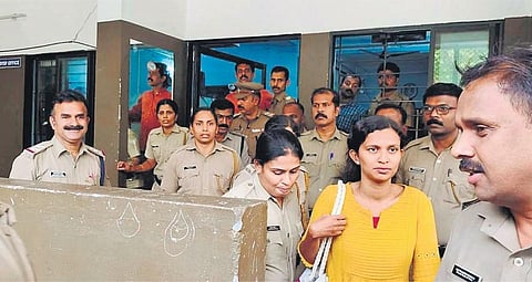 Police escort K Vidya out of the Munsiff Magistrate Court in Mannarkad on Thursday