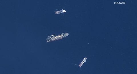 In this satellite image, from top to bottom, the vessels Horizon Arctic, Deep Energy and Skandi Vinland search for the missing submersible Titan.(Photo | Maxar Technologies via AP)