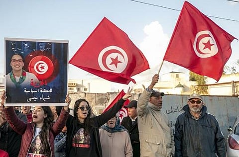 Supporters of Chaima Issa protesting in front of the prison where she is held.