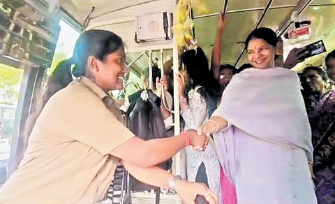 DMK MP Kanimozhi travelling with Coimbatore’s first women bus driver M Sharmila on Friday | Express