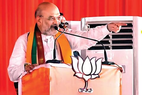 Union Home Minister Amit Shah at a public meeting organised on the completion of nine years of the NDA government. (Photo| PTI)