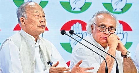 Former Manipur chief minister Okram Ibobi Singh and AICC general secretary Jairam Ramesh address the media at AICC headquarters in New Delhi. ( Photo | PTI)