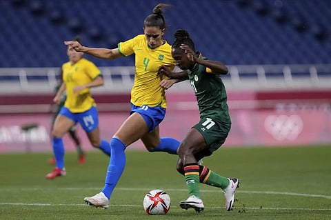 Brazil's Rafaelle, left, and Zambia's Babra Banda battle for the ball during a women's soccer match at the 2020 Summer Olympics, July 27, 2021 in Japan. (File Photo | AP)