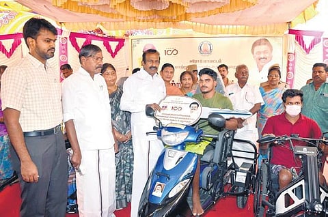 Minister S Muthuswamy distributing assistance to 145 differently abled beneficiaries at the Erode collectorate on Monday | Express