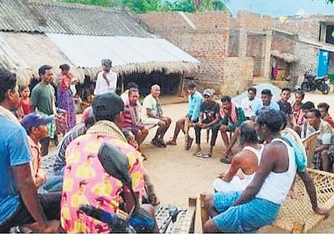 The tribal locals of Lauguda village during a meeting I EXPRESS