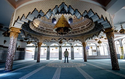 A man stands inside the Abu-Bakr-Mosque in Frankfurt, Germany on June 29, 2023. (Photo | AP)