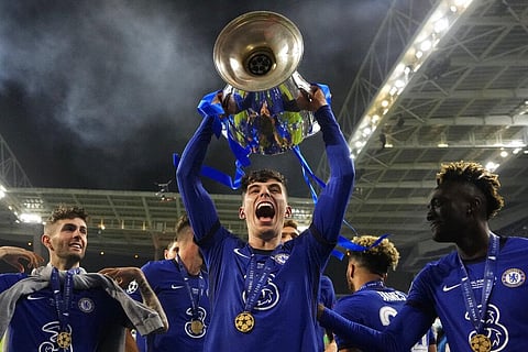 FILE - Chelsea's Kai Havertz celebrates with the trophy after winning the Champions League final soccer match between Manchester City and Chelsea. (Photo | AP)