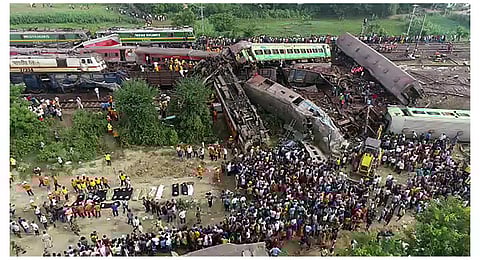 Resucue work underway after an accident involving Coromandel Express, Bengaluru-Howrah Express and a goods train, in Balasore district, Saturday. (Photo | PTI)