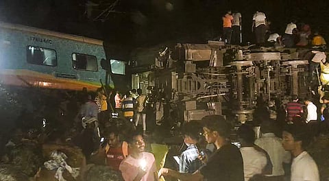 Rescue operation being conducted after four coaches of the Coromandel Express derailed after a head-on collision with a goods train