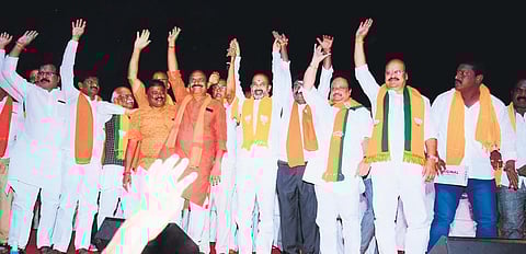 BJP State president Bandi Sanjay, AP Jithender Reddy and other leaders wave to the people at a public meeting in Athmakur on Thursday