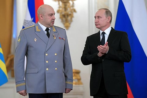 Russian President Vladimir Putin applauds Col. Gen. Sergei Surovikin during an awards ceremony for troops who fought in Syria, in the Kremlin. (File Photo | AP)