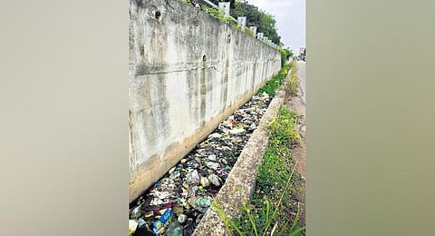 The garbage-filled drain near Thampuranmukku at NH66 bypass in Thiruvananthapuram