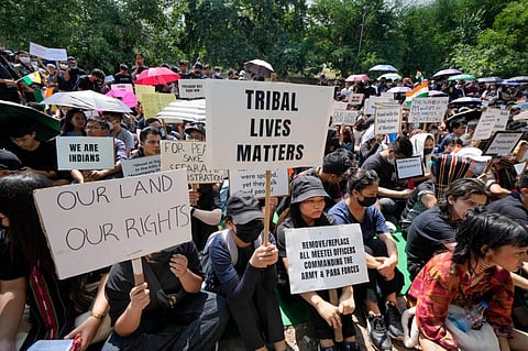 Tribal people of Manipur take part in a 'Tribunal Solidarity protest' against the ongoing tensions in the state, at Jantar Mantar, in New Delhi, on May 31, 2023. (PTI)