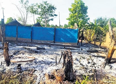 Charred remains of the houses at Lakhanpur village in Raighar block. | Express
