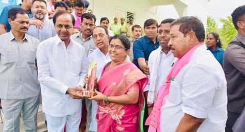 CM K Chandrasekhar Rao felicitates sarpanch Gadge Meenakshi for her efforts in developing Mukhra (K) and winning many awards, on Sunday
