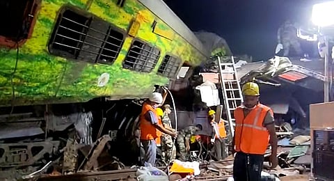 Rescue workers look for survivors at the accident site, in Bahanaga (Photo | Express)