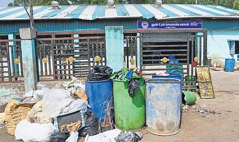 Bins placed in front of one of the corporation’s compost centres at Vayalur road in Tiruchy | mk ashok kumar