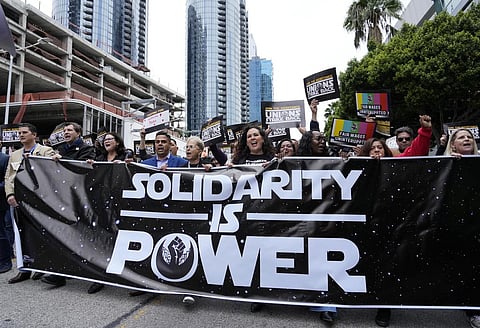 Union members march through downtown Los Angeles at the 'Unions Strike Back' rally on Friday, May 26, 2023. (Photo | AP)