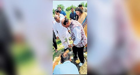 Delhi Lt Governor V K Saxena and Union minister Meenakshi Lekhi plant Saplings of chinar and cherry blossoms at Yamuna floodplains