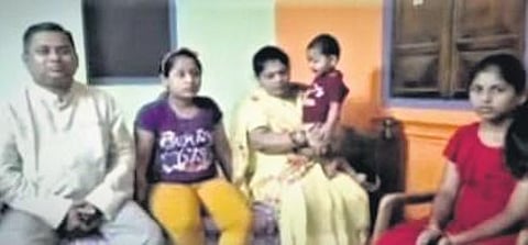 Manoranjan Padhy with his family members at Digapahandi | Express