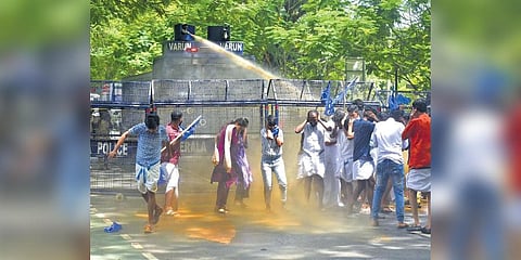 Police resort to water cannon to disperse KSU activists protesting in front of Maharaja’s College in Kochi in connection with the mark list row | A Sanesh