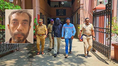 Police personnel take 56-year-old accused Manoj Sane into custody for allegedly chopped and boiled body parts of his live-in partner at Mira Road locality, in Thane district. (Photo | PTI)