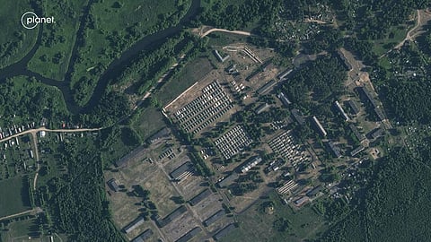 This satellite image provided by Planet Labs PBC shows apparent recent construction of tents at a former military base outside the Belarusian town of Osipovichi. (Photo | AP)
