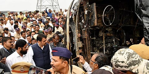 Maharashtra CM Eknath Shinde and Deputy Chief Minister Devendra Fadnavis visit the site where a bus met with an accident and caught fire killing at least 25 passengers | PTI