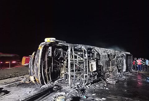 Bus carrying 35 passengers first met an accident by smashing divider & later caught the fire. (Photo | Special arrangement)