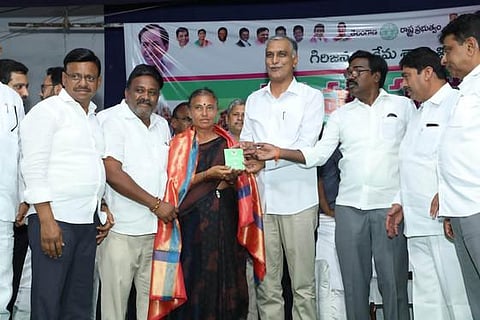 'Ministers T Harish Rao and Puvvada Ajay kumar distributed pattas to podu farmers in khammam today'