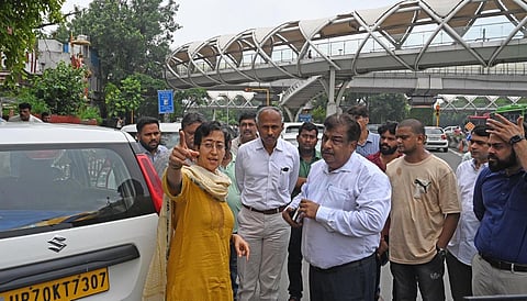 Delhi Education and PWD Minister Atishi during the inspection of the waterlogged areas after heavy monsoon rains (Photo | Shekhar Yadav, EPS)