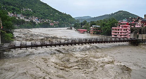 The swollen Beas river as it flows above the danger mark following heavy monsoon rains, in Mandi, Monday, July 10, 2023. (Photo | PTI)