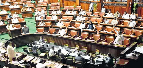 Chief Minister Siddaramaiah and BJP MLA Basanagouda Patil Yatnal in a heated discussion in the Assembly on Wednesday | Express