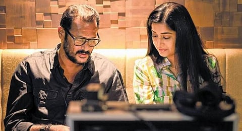 Padmakumar with Meera Jasmine.