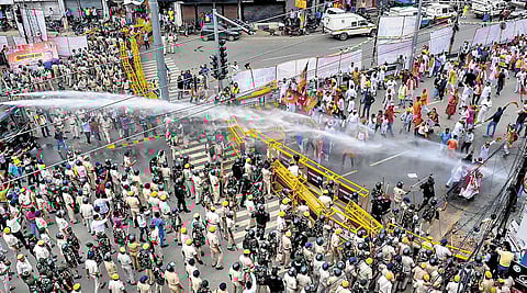 Security personnel use a water cannon to disperse BJP supporters during their march towards Vidhan Sabha in Patna on Thursday | pti