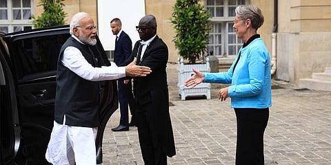 French Prime Minister Elisabeth Borne welcomes Indian Prime Minister Narendra Modi, Thursday, July 13, 2023 in Paris. (Photo | PTI)
