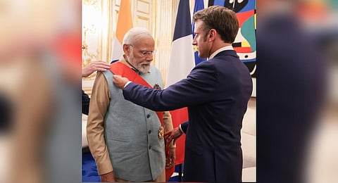 Prime Minister Narendra Modi conferred with France's highest civilian and military honour by French President Emmanuel Macron.(Photo | Twitter, @MEAIndia))
