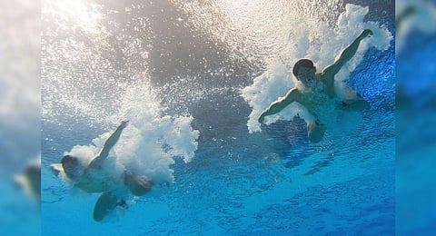 China’s Long Daoyi and Wang Zongyuan compete in the final of the men's 3m synchronised diving event during the World Aquatics Championships in Fukuoka. (Photo | AFP)