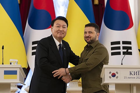 South Korean President Yoon Suk Yeol, left, and Ukrainian President Volodymyr Zelensky. (Photo | AP)