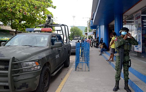 Mexican Army soldiers checks the area where Mexican journalist Nelson Mateus was murdered. (Photo|AFP)