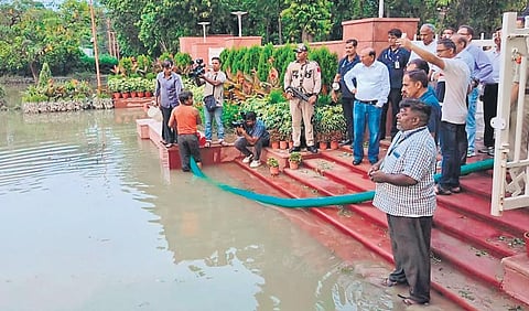 L-G VK Saxena oversees water clearance work at Raj Ghat on Sunday | Express