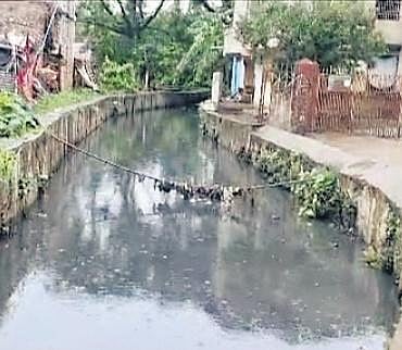The open drain at Nima Sahi; (Inset) Rahul Khati | express